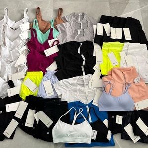 MYSTERY LULULEMON & MORE BOX THAT WILL INCLUDE A NWT LULULEMON BELT BAG
